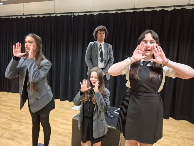 Year 13 drama students have been rehearsing intensively this week in preparation for their practical exam. They have devised their own original piece, exploring the style of Brecht and the impact of political theatre.
